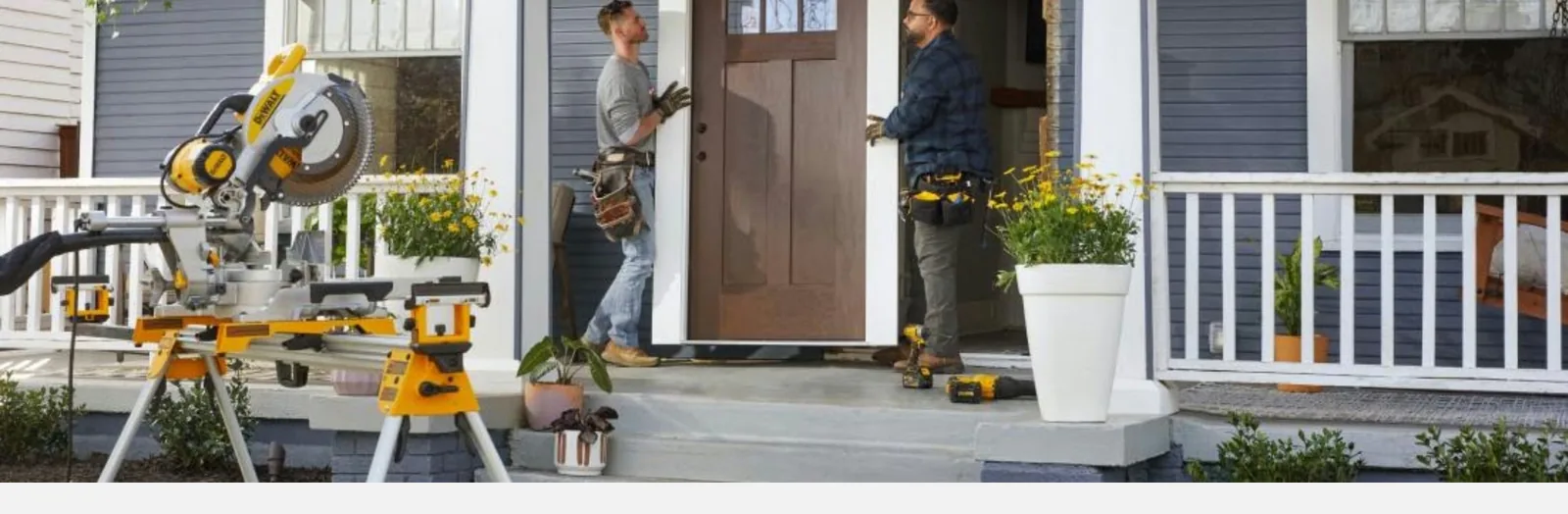 Rampart Door technicians on a residential job